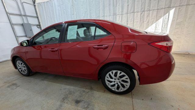 2019 Red Toyota Corolla LE (5YFBURHE6KP) with an 1.8L I-4 DOHC engine, located at 1806 Veterans Memorial Hwy SW, Austell, GA, 30168, (770) 944-9558, 33.817959, -84.606987 - Photo#2