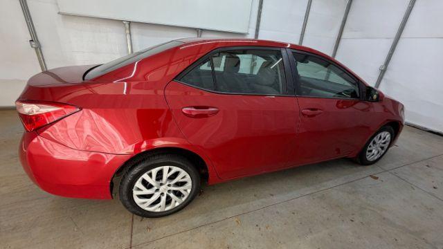 2019 Red Toyota Corolla LE (5YFBURHE6KP) with an 1.8L I-4 DOHC engine, located at 1806 Veterans Memorial Hwy SW, Austell, GA, 30168, (770) 944-9558, 33.817959, -84.606987 - Photo#7