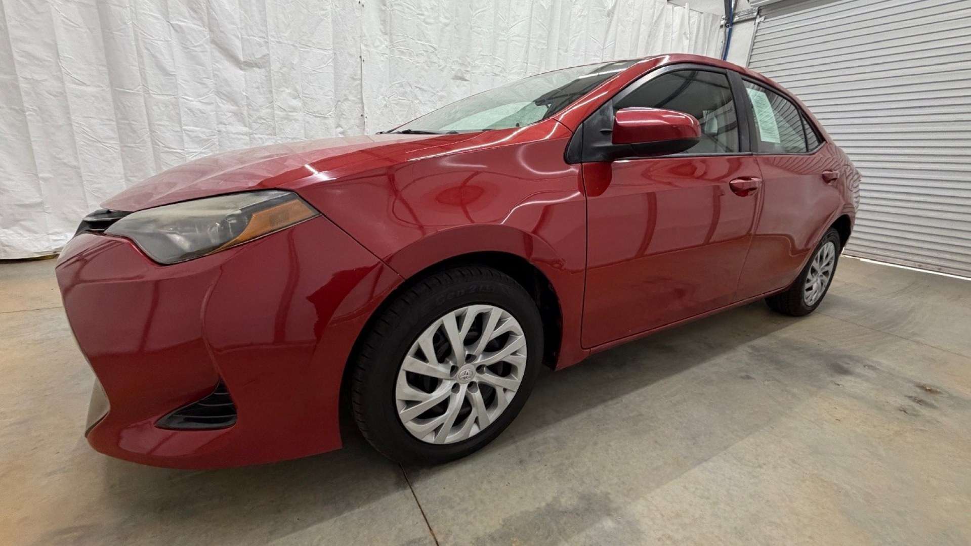 2019 Red Toyota Corolla LE (5YFBURHE6KP) with an 1.8L I-4 DOHC engine, located at 1806 Veterans Memorial Hwy SW, Austell, GA, 30168, (770) 944-9558, 33.817959, -84.606987 - Photo#1