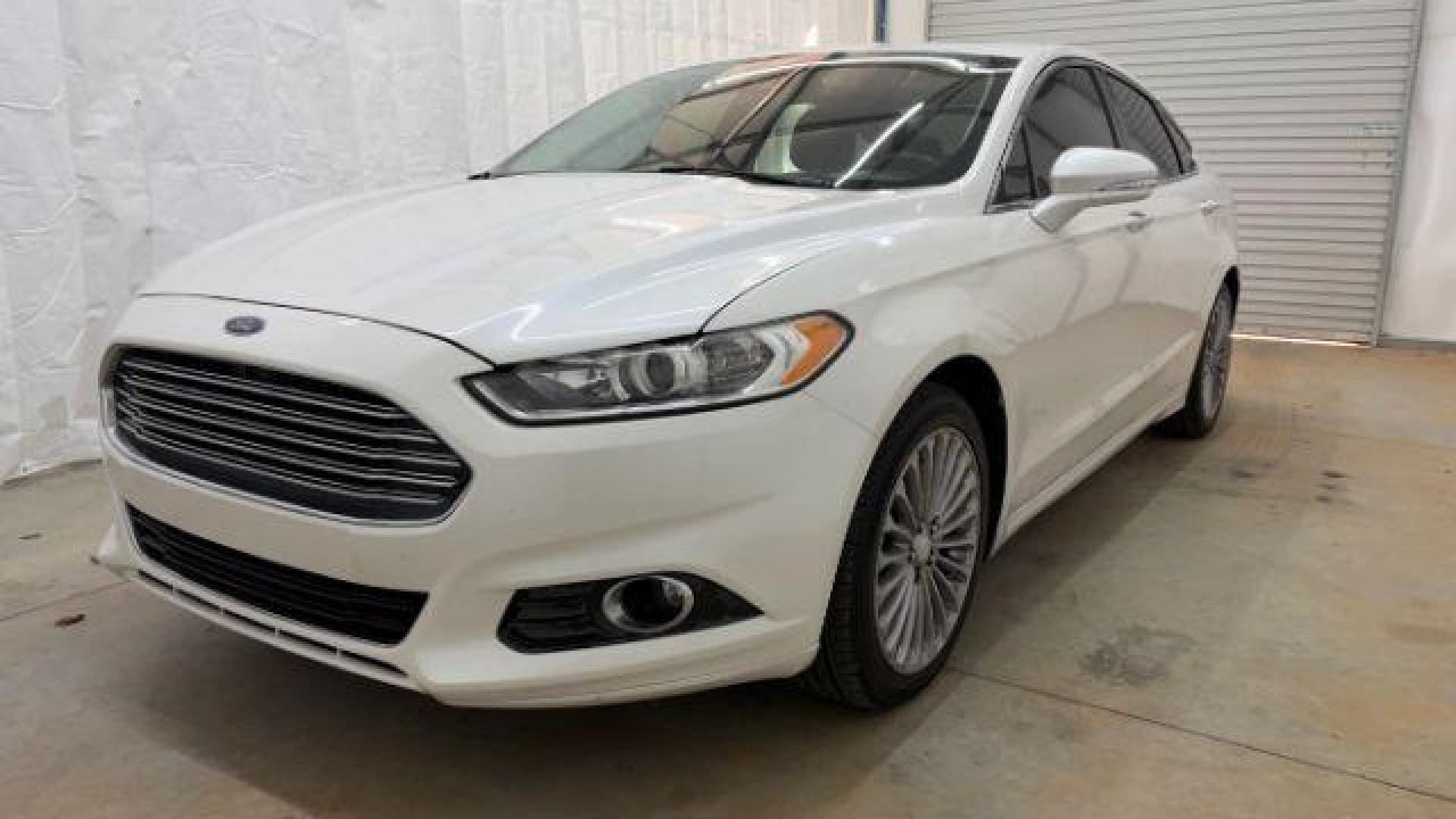 2013 White Ford Fusion Titanium (3FA6P0K98DR) with an EcoBoost 2L I-4 gasoline direct injection engine, located at 1806 Veterans Memorial Hwy SW, Austell, GA, 30168, (770) 944-9558, 33.817959, -84.606987 - Photo#0