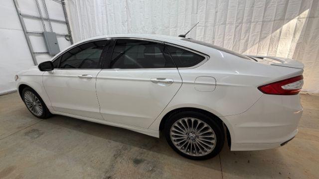 2013 White Ford Fusion Titanium (3FA6P0K98DR) with an EcoBoost 2L I-4 gasoline direct injection engine, located at 1806 Veterans Memorial Hwy SW, Austell, GA, 30168, (770) 944-9558, 33.817959, -84.606987 - Photo#2