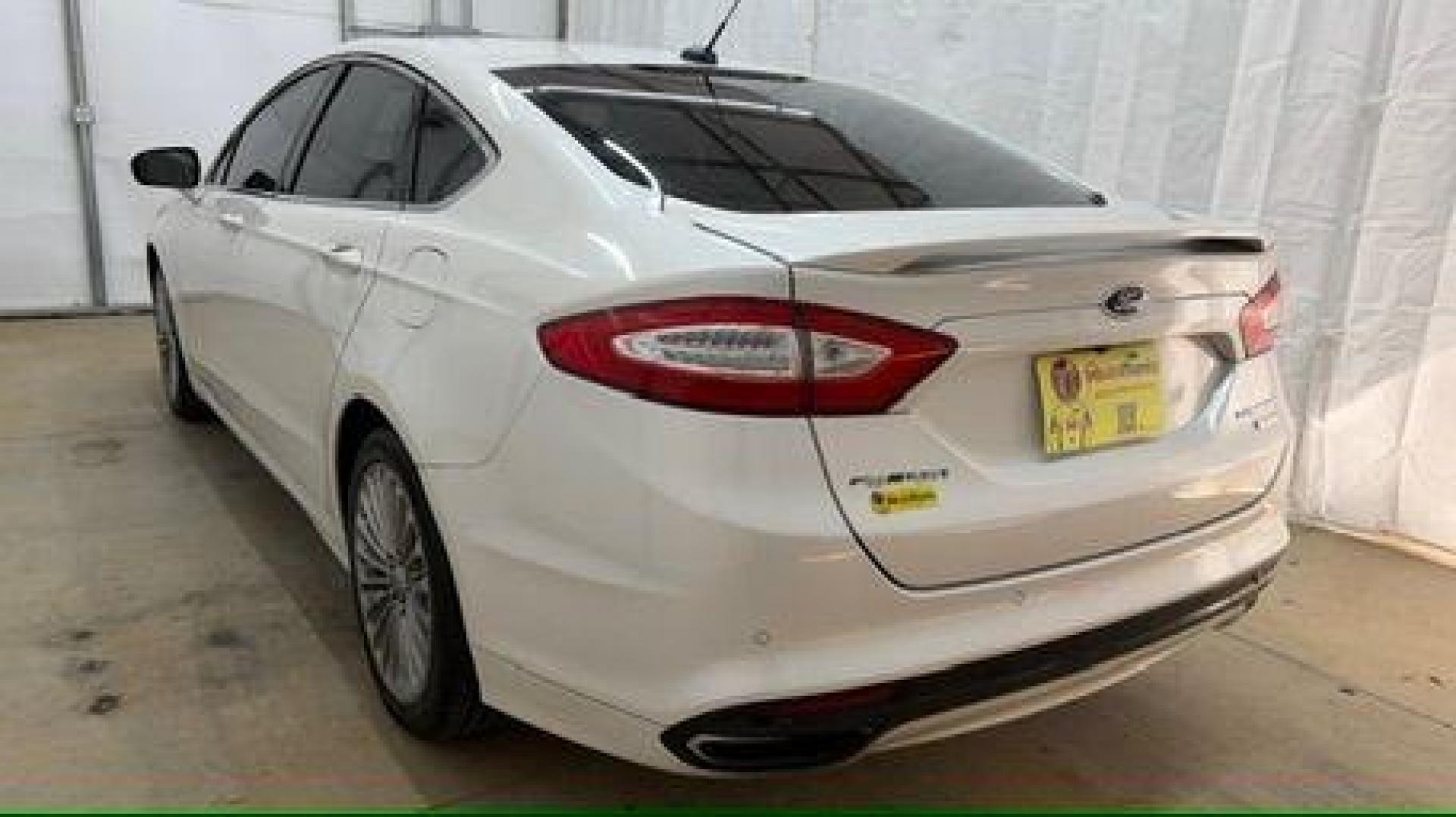 2013 White Ford Fusion Titanium (3FA6P0K98DR) with an EcoBoost 2L I-4 gasoline direct injection engine, located at 1806 Veterans Memorial Hwy SW, Austell, GA, 30168, (770) 944-9558, 33.817959, -84.606987 - Photo#3