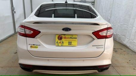 2013 White Ford Fusion Titanium (3FA6P0K98DR) with an EcoBoost 2L I-4 gasoline direct injection engine, located at 1806 Veterans Memorial Hwy SW, Austell, GA, 30168, (770) 944-9558, 33.817959, -84.606987 - Photo#4