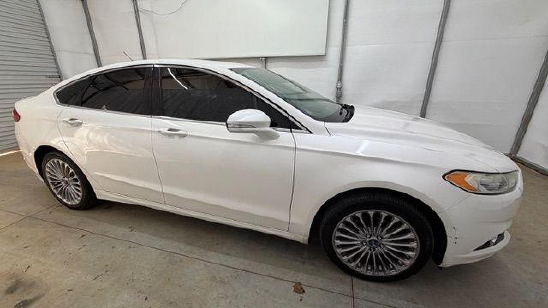 2013 White Ford Fusion Titanium (3FA6P0K98DR) with an EcoBoost 2L I-4 gasoline direct injection engine, located at 1806 Veterans Memorial Hwy SW, Austell, GA, 30168, (770) 944-9558, 33.817959, -84.606987 - Photo#7