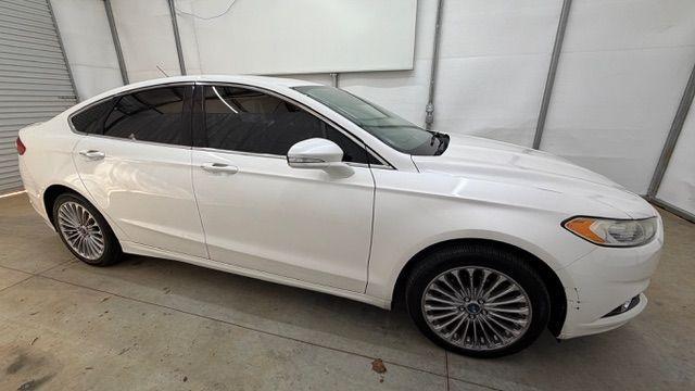 2013 White Ford Fusion Titanium (3FA6P0K98DR) with an EcoBoost 2L I-4 gasoline direct injection engine, located at 1806 Veterans Memorial Hwy SW, Austell, GA, 30168, (770) 944-9558, 33.817959, -84.606987 - Photo#7