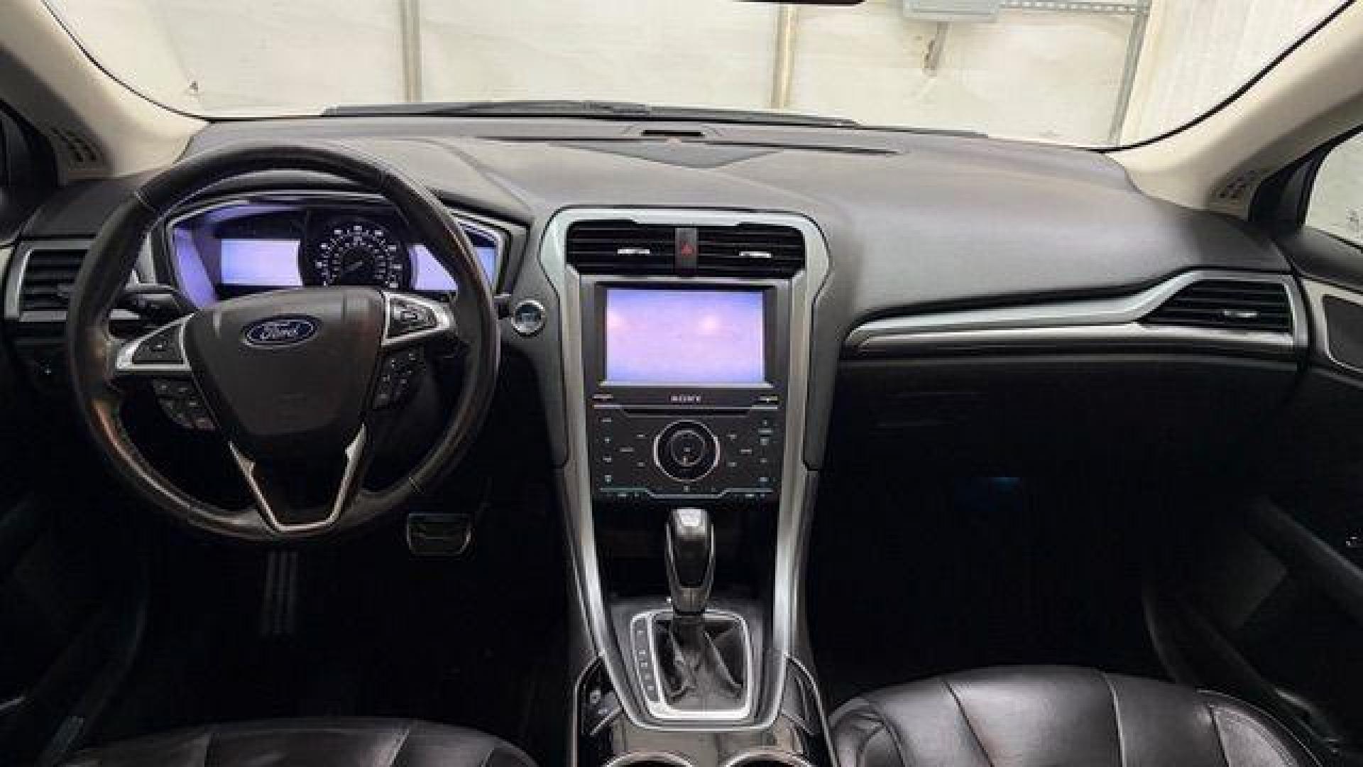 2013 White Ford Fusion Titanium (3FA6P0K98DR) with an EcoBoost 2L I-4 gasoline direct injection engine, located at 1806 Veterans Memorial Hwy SW, Austell, GA, 30168, (770) 944-9558, 33.817959, -84.606987 - Photo#17