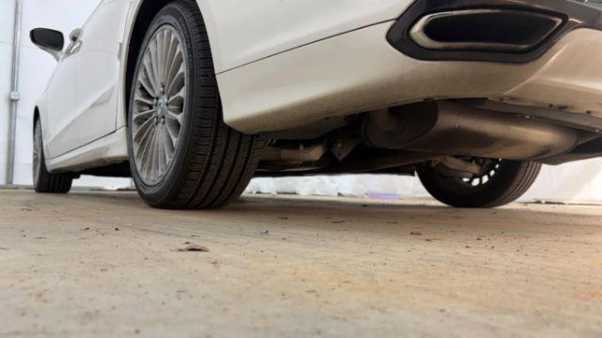 2013 White Ford Fusion Titanium (3FA6P0K98DR) with an EcoBoost 2L I-4 gasoline direct injection engine, located at 1806 Veterans Memorial Hwy SW, Austell, GA, 30168, (770) 944-9558, 33.817959, -84.606987 - Photo#20