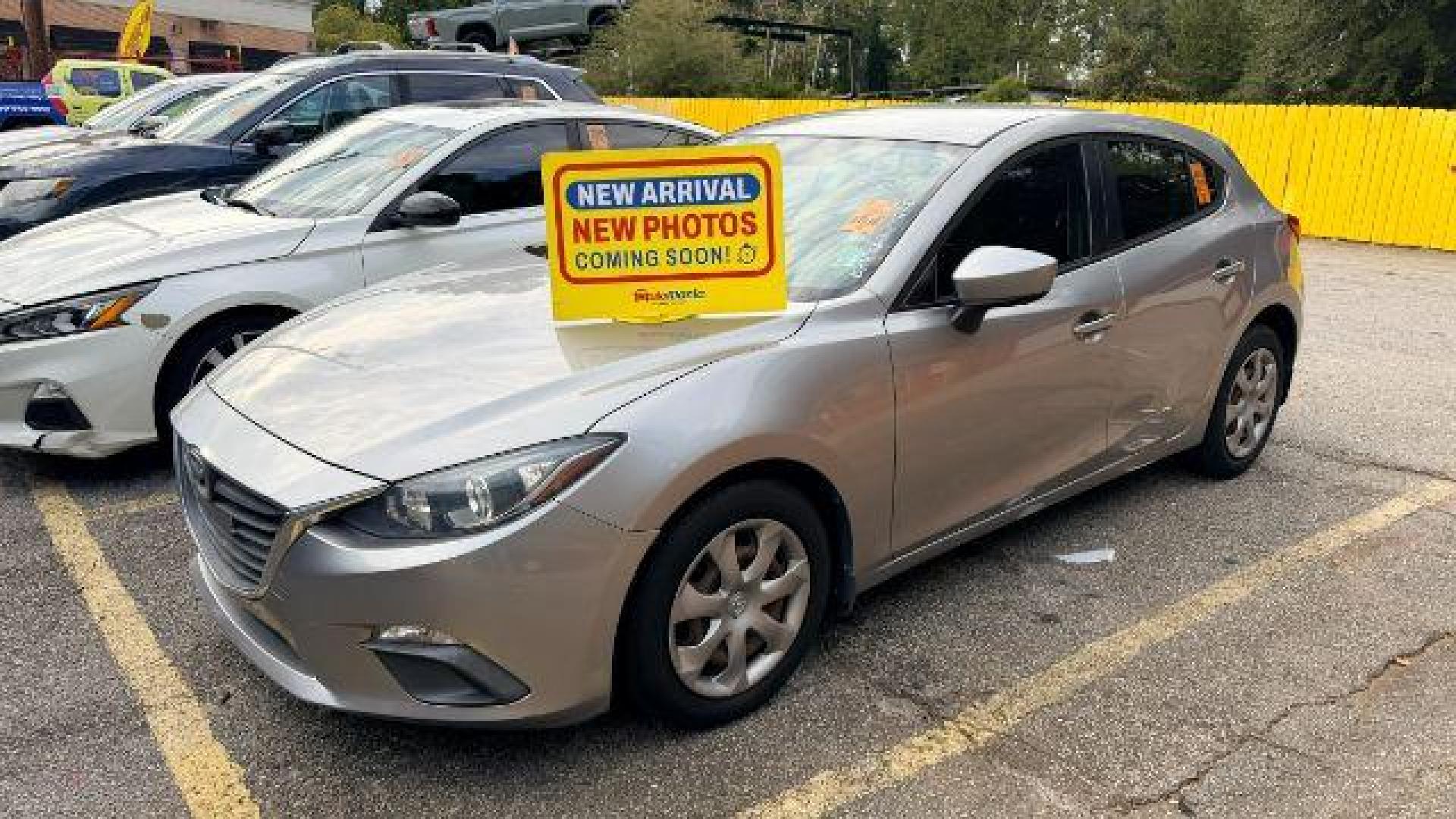 2015 Silver Mazda Mazda3 Hatchback i Sport (3MZBM1K79FM) with an SKYACTIV-G 2L I-4 gasoline direct injection engine, located at 1806 Veterans Memorial Hwy SW, Austell, GA, 30168, (770) 944-9558, 33.817959, -84.606987 - Photo#0