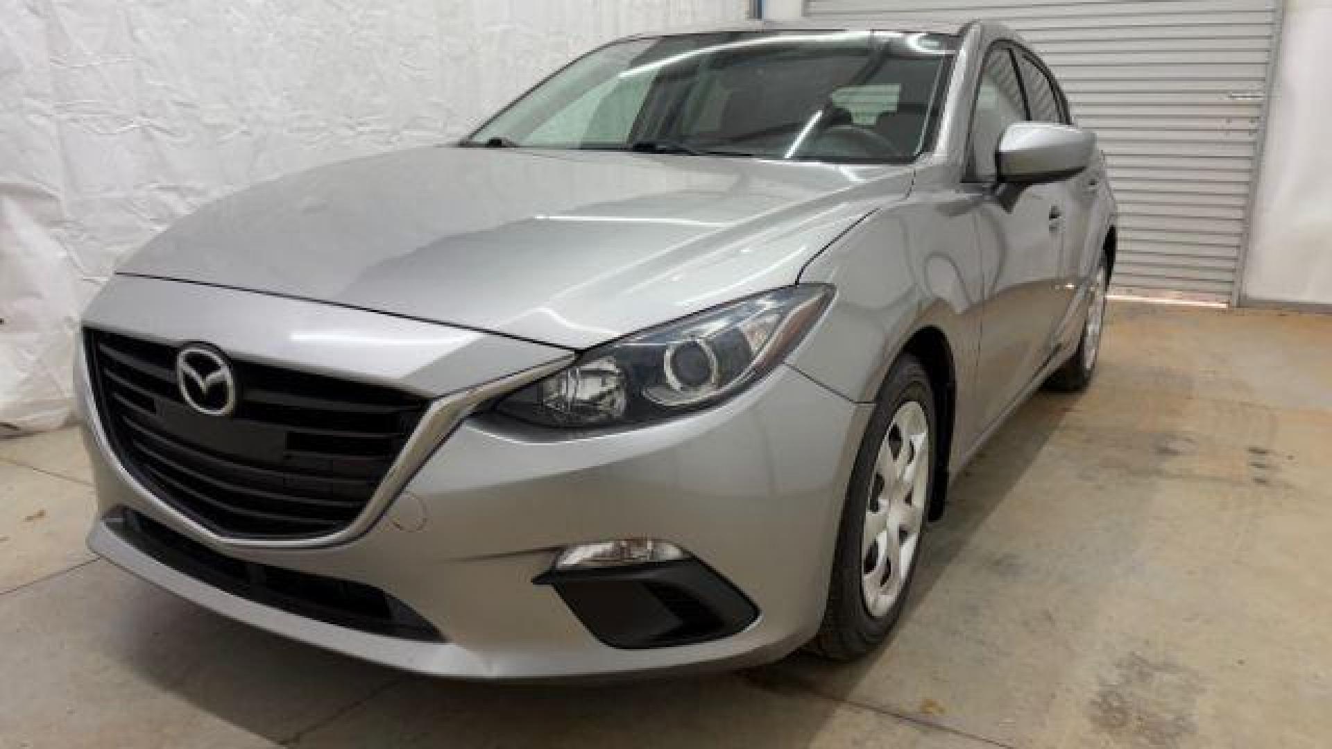 2015 Silver Mazda Mazda3 Hatchback i Sport (3MZBM1K79FM) with an SKYACTIV-G 2L I-4 gasoline direct injection engine, located at 1806 Veterans Memorial Hwy SW, Austell, GA, 30168, (770) 944-9558, 33.817959, -84.606987 - Photo#0