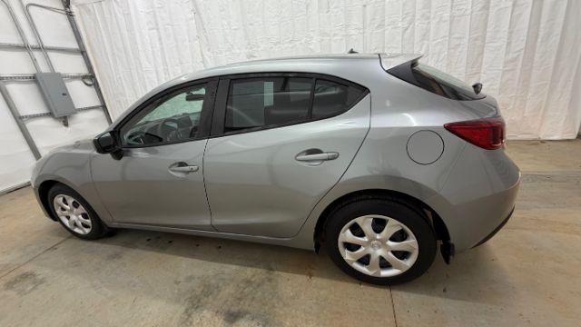 2015 Silver Mazda Mazda3 Hatchback i Sport (3MZBM1K79FM) with an SKYACTIV-G 2L I-4 gasoline direct injection engine, located at 1806 Veterans Memorial Hwy SW, Austell, GA, 30168, (770) 944-9558, 33.817959, -84.606987 - Photo#2