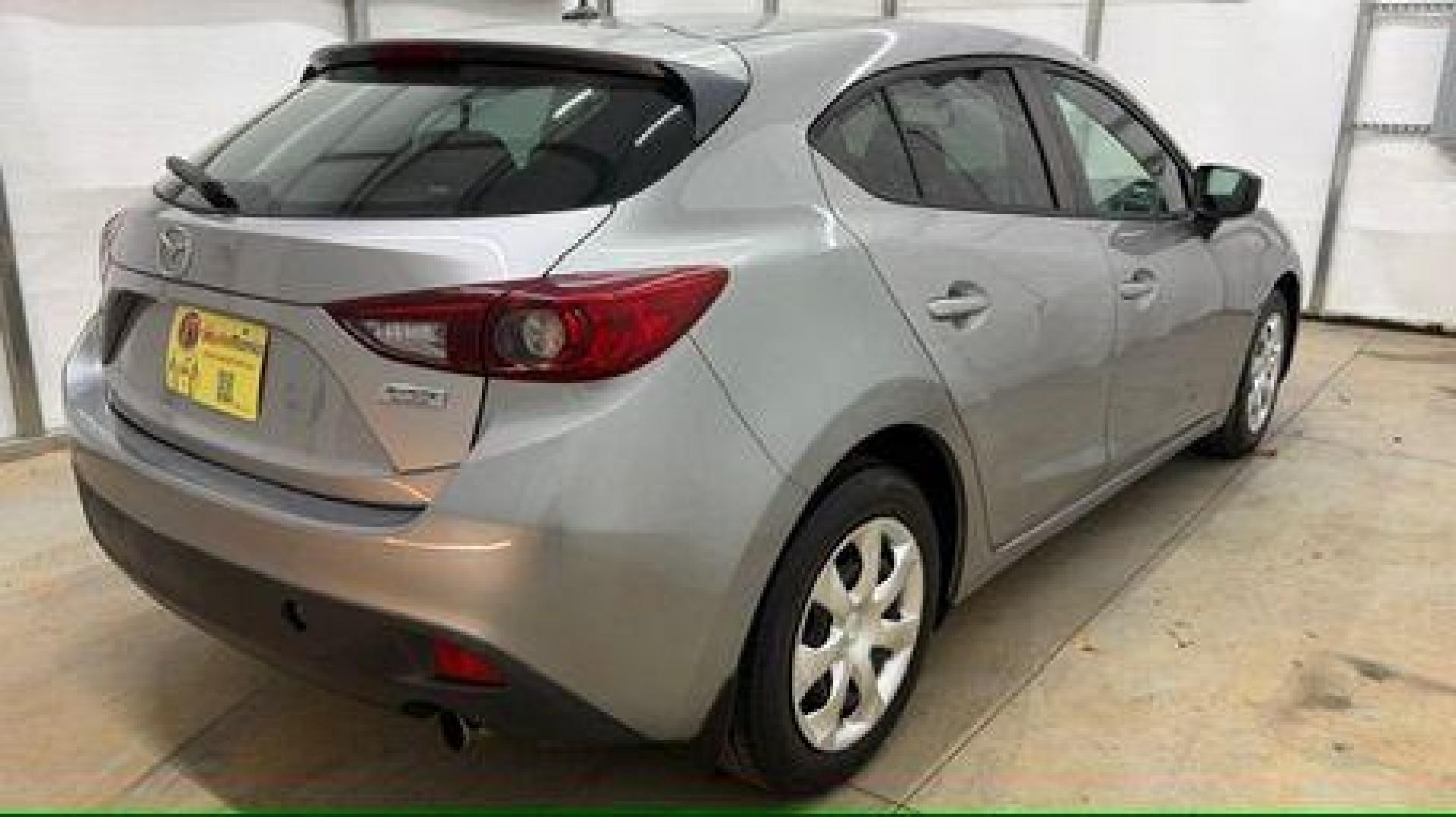 2015 Silver Mazda Mazda3 Hatchback i Sport (3MZBM1K79FM) with an SKYACTIV-G 2L I-4 gasoline direct injection engine, located at 1806 Veterans Memorial Hwy SW, Austell, GA, 30168, (770) 944-9558, 33.817959, -84.606987 - Photo#5