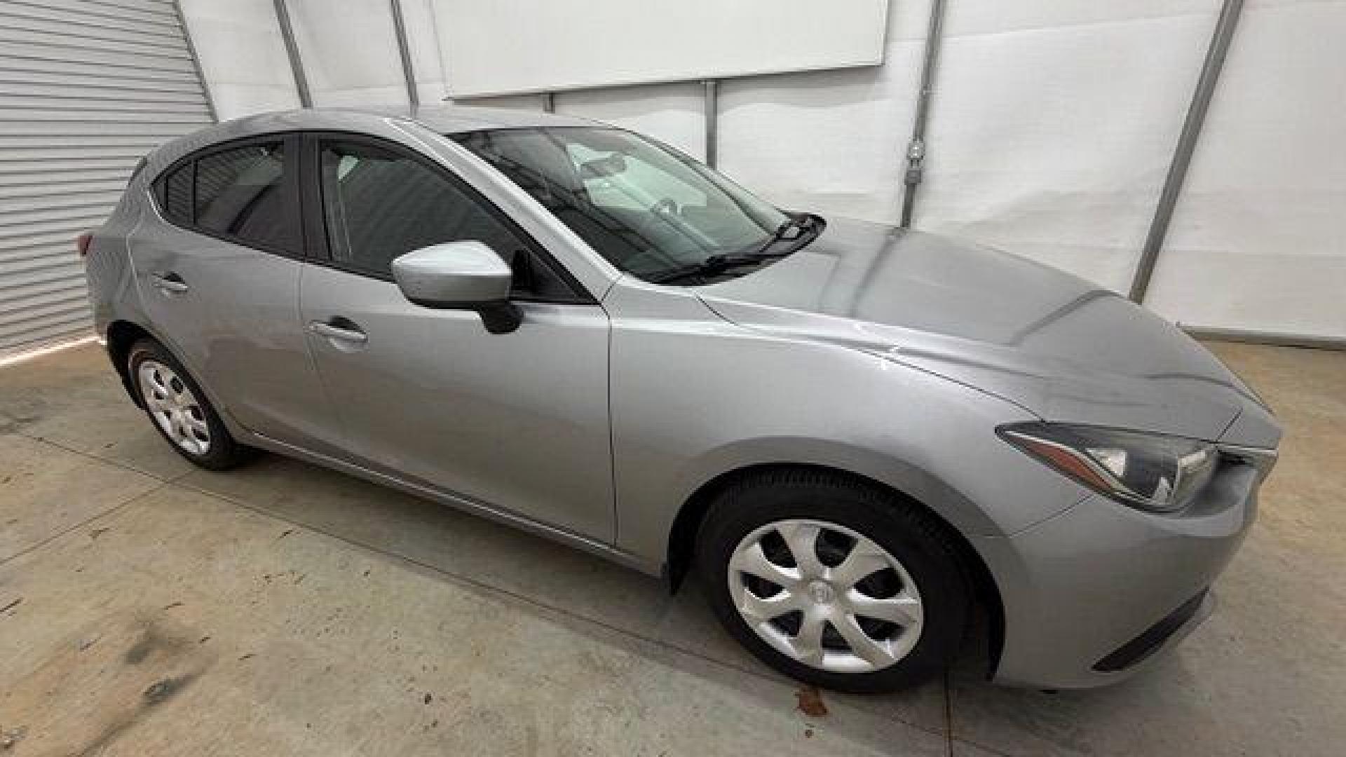 2015 Silver Mazda Mazda3 Hatchback i Sport (3MZBM1K79FM) with an SKYACTIV-G 2L I-4 gasoline direct injection engine, located at 1806 Veterans Memorial Hwy SW, Austell, GA, 30168, (770) 944-9558, 33.817959, -84.606987 - Photo#7