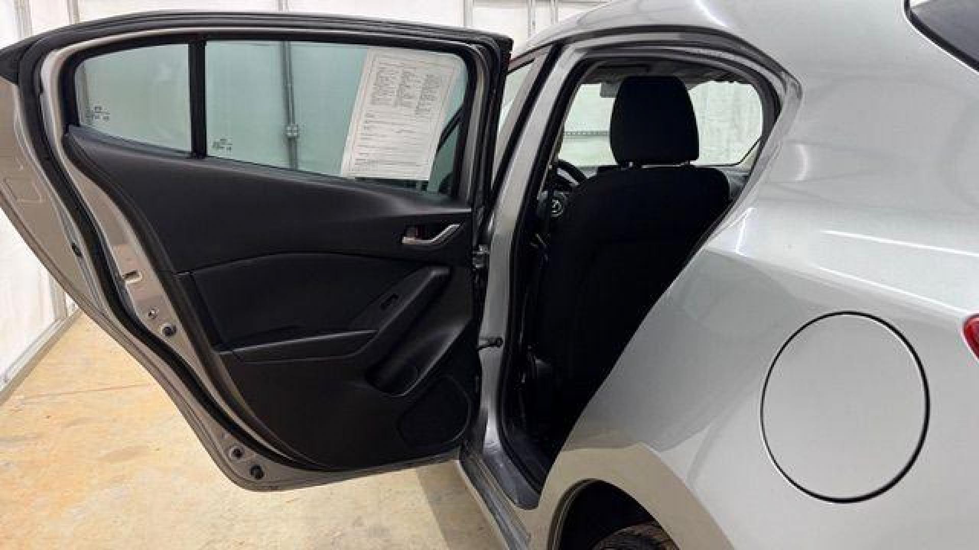 2015 Silver Mazda Mazda3 Hatchback i Sport (3MZBM1K79FM) with an SKYACTIV-G 2L I-4 gasoline direct injection engine, located at 1806 Veterans Memorial Hwy SW, Austell, GA, 30168, (770) 944-9558, 33.817959, -84.606987 - Photo#13