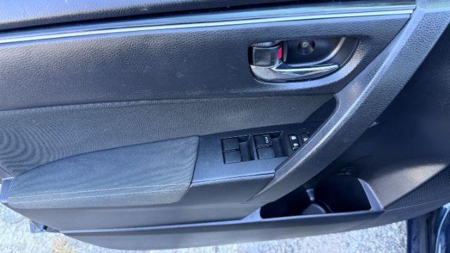 2018 Blue Toyota Corolla LE (5YFBURHE2JP) with an 1.8L I-4 DOHC engine, located at 1806 Veterans Memorial Hwy SW, Austell, GA, 30168, (770) 944-9558, 33.817959, -84.606987 - Photo#9