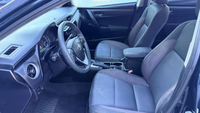 2018 Blue Toyota Corolla LE (5YFBURHE2JP) with an 1.8L I-4 DOHC engine, located at 1806 Veterans Memorial Hwy SW, Austell, GA, 30168, (770) 944-9558, 33.817959, -84.606987 - Photo#10