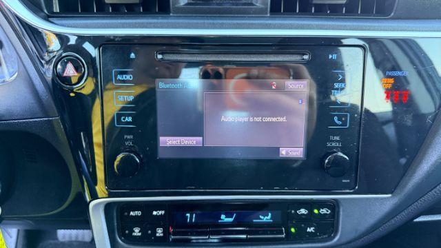 2018 Blue Toyota Corolla LE (5YFBURHE2JP) with an 1.8L I-4 DOHC engine, located at 1806 Veterans Memorial Hwy SW, Austell, GA, 30168, (770) 944-9558, 33.817959, -84.606987 - Photo#12