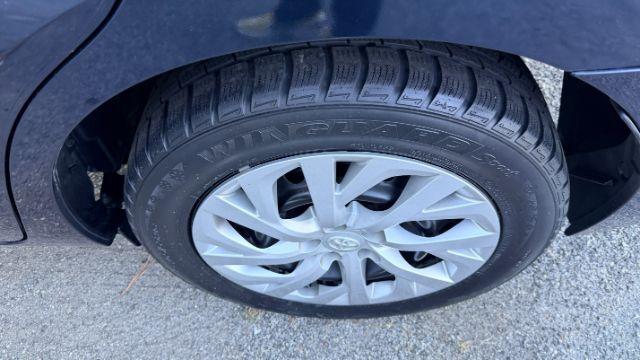 2018 Blue Toyota Corolla LE (5YFBURHE2JP) with an 1.8L I-4 DOHC engine, located at 1806 Veterans Memorial Hwy SW, Austell, GA, 30168, (770) 944-9558, 33.817959, -84.606987 - Photo#16