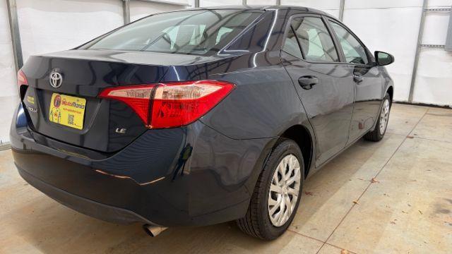 2018 Blue Toyota Corolla LE (5YFBURHE2JP) with an 1.8L I-4 DOHC engine, located at 1806 Veterans Memorial Hwy SW, Austell, GA, 30168, (770) 944-9558, 33.817959, -84.606987 - Photo#5