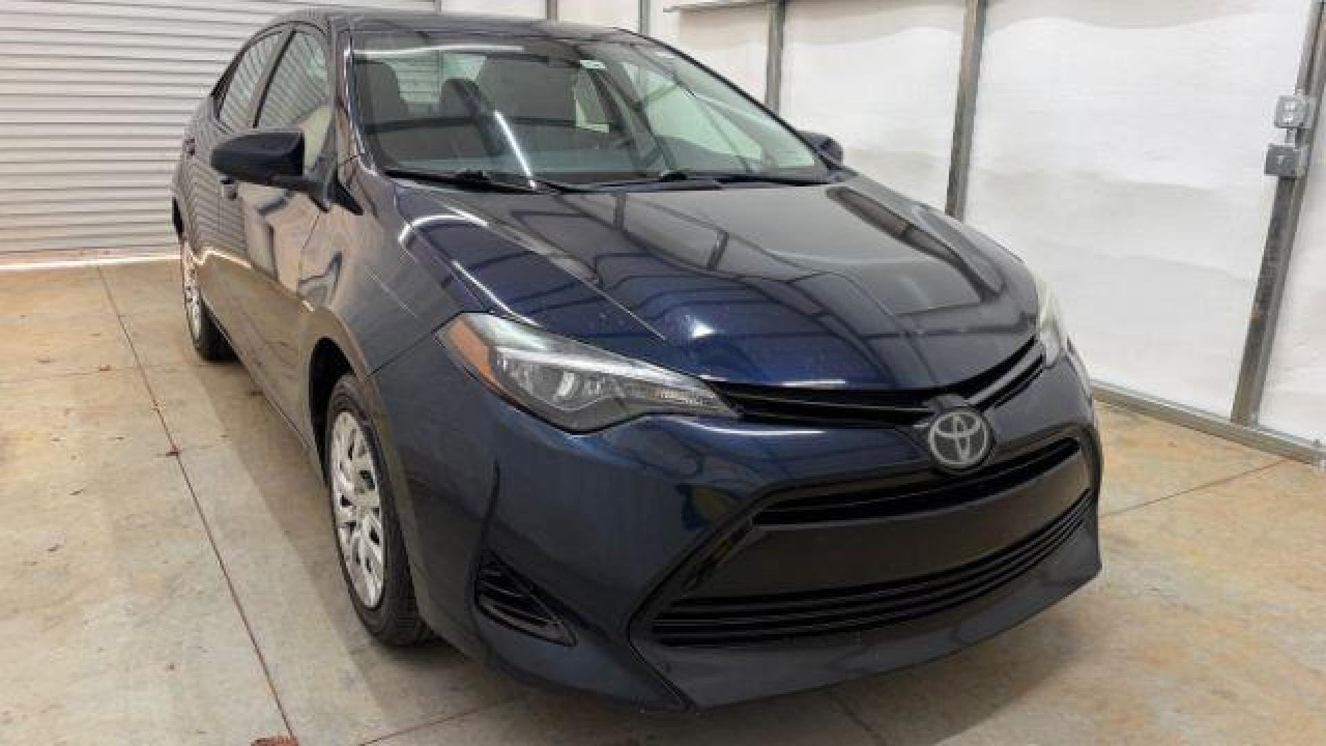 2018 Blue Toyota Corolla LE (5YFBURHE2JP) with an 1.8L I-4 DOHC engine, located at 1806 Veterans Memorial Hwy SW, Austell, GA, 30168, (770) 944-9558, 33.817959, -84.606987 - Photo#9