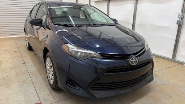 2018 Blue Toyota Corolla LE (5YFBURHE2JP) with an 1.8L I-4 DOHC engine, located at 1806 Veterans Memorial Hwy SW, Austell, GA, 30168, (770) 944-9558, 33.817959, -84.606987 - Photo#9