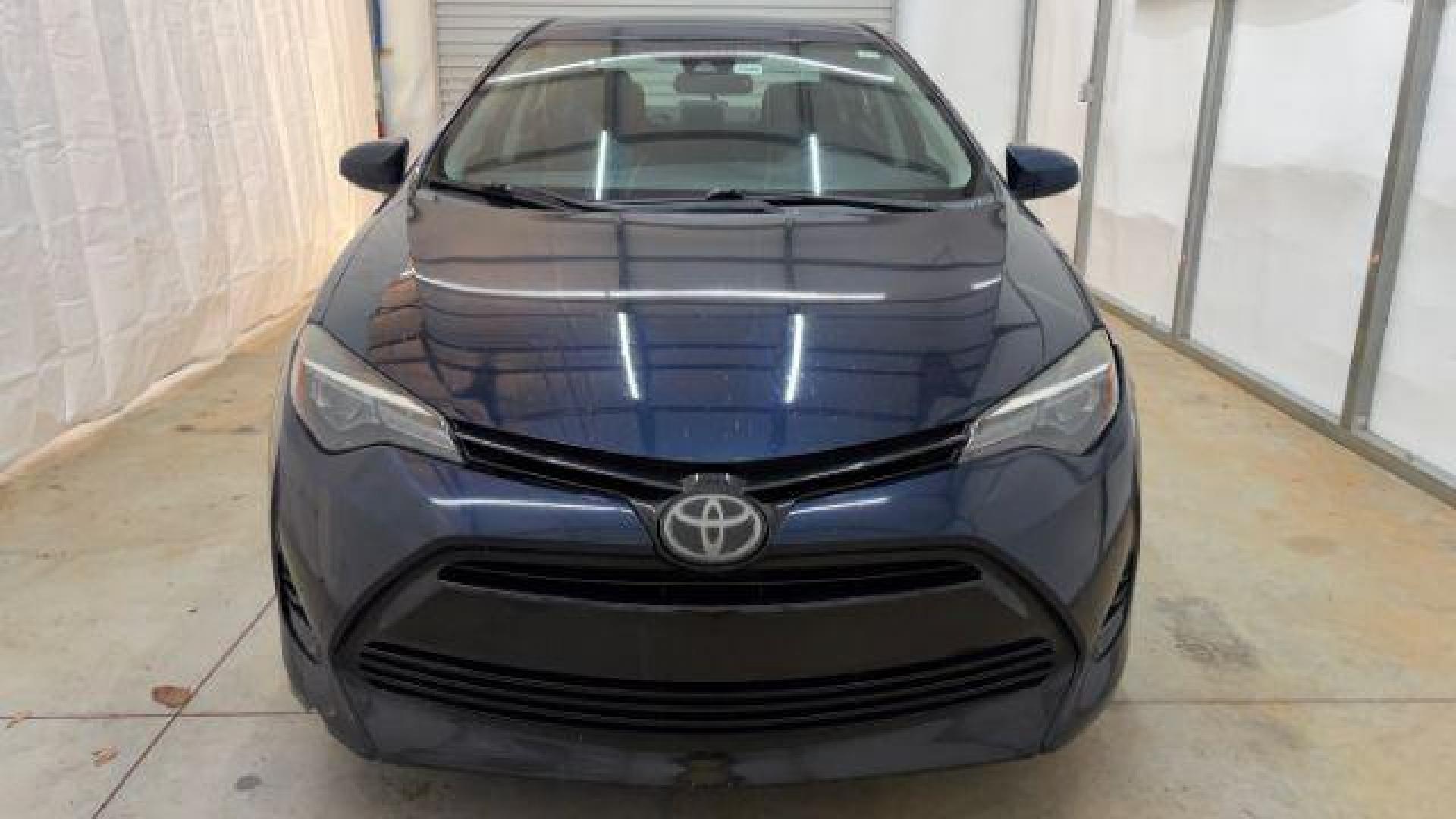 2018 Blue Toyota Corolla LE (5YFBURHE2JP) with an 1.8L I-4 DOHC engine, located at 1806 Veterans Memorial Hwy SW, Austell, GA, 30168, (770) 944-9558, 33.817959, -84.606987 - Photo#10