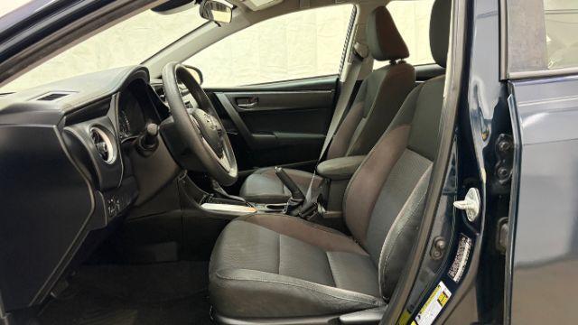 2018 Blue Toyota Corolla LE (5YFBURHE2JP) with an 1.8L I-4 DOHC engine, located at 1806 Veterans Memorial Hwy SW, Austell, GA, 30168, (770) 944-9558, 33.817959, -84.606987 - Photo#12