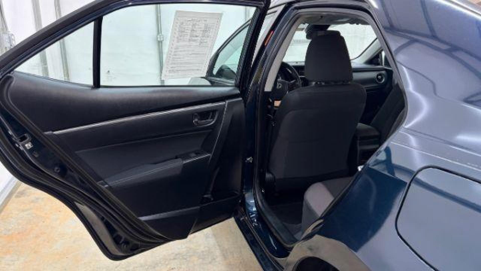 2018 Blue Toyota Corolla LE (5YFBURHE2JP) with an 1.8L I-4 DOHC engine, located at 1806 Veterans Memorial Hwy SW, Austell, GA, 30168, (770) 944-9558, 33.817959, -84.606987 - Photo#14