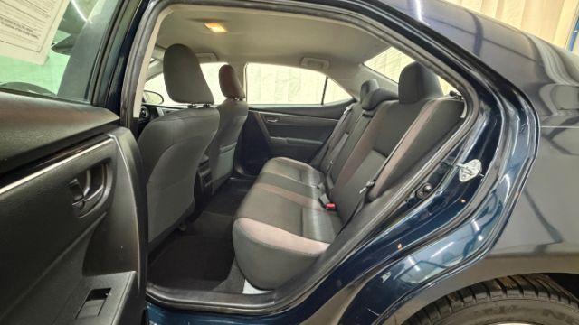 2018 Blue Toyota Corolla LE (5YFBURHE2JP) with an 1.8L I-4 DOHC engine, located at 1806 Veterans Memorial Hwy SW, Austell, GA, 30168, (770) 944-9558, 33.817959, -84.606987 - Photo#15