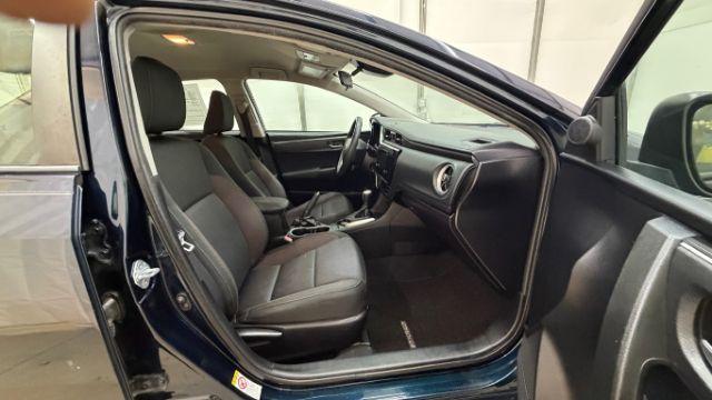 2018 Blue Toyota Corolla LE (5YFBURHE2JP) with an 1.8L I-4 DOHC engine, located at 1806 Veterans Memorial Hwy SW, Austell, GA, 30168, (770) 944-9558, 33.817959, -84.606987 - Photo#18