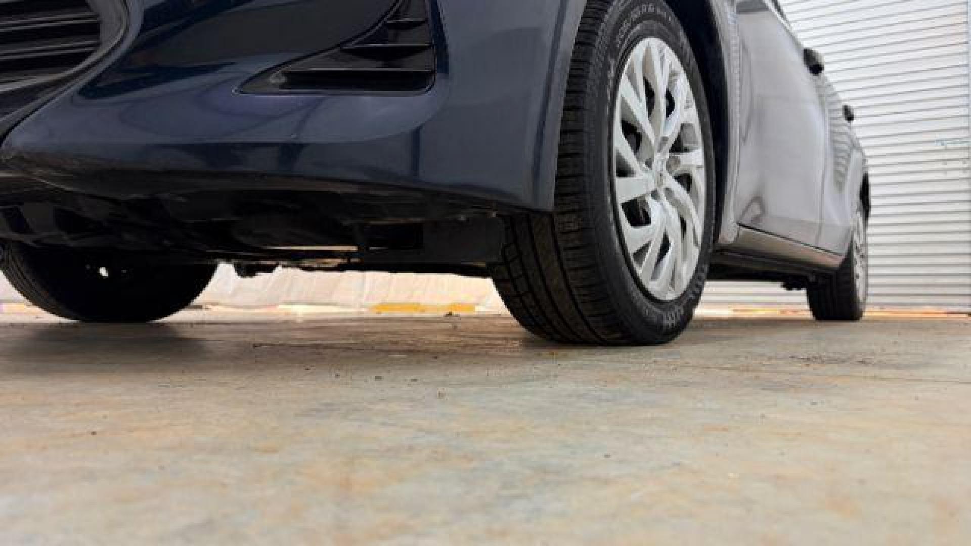 2018 Blue Toyota Corolla LE (5YFBURHE2JP) with an 1.8L I-4 DOHC engine, located at 1806 Veterans Memorial Hwy SW, Austell, GA, 30168, (770) 944-9558, 33.817959, -84.606987 - Photo#21