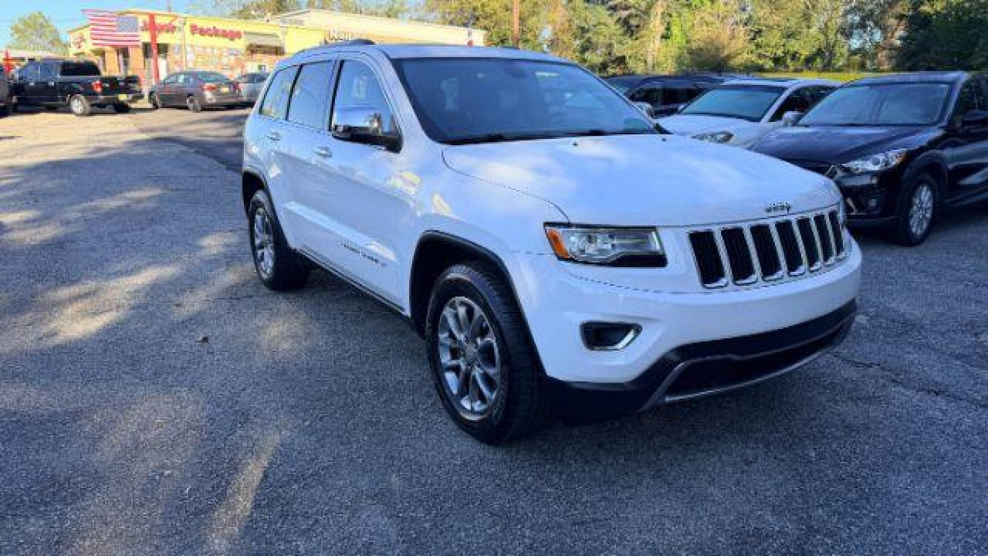 2014 White Jeep Grand Cherokee Limited (1C4RJEBG8EC) , located at 1806 Veterans Memorial Hwy SW, Austell, GA, 30168, (770) 944-9558, 33.817959, -84.606987 - Photo#2