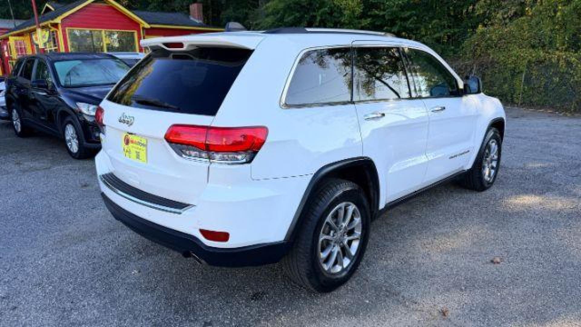 2014 White Jeep Grand Cherokee Limited (1C4RJEBG8EC) , located at 1806 Veterans Memorial Hwy SW, Austell, GA, 30168, (770) 944-9558, 33.817959, -84.606987 - Photo#3