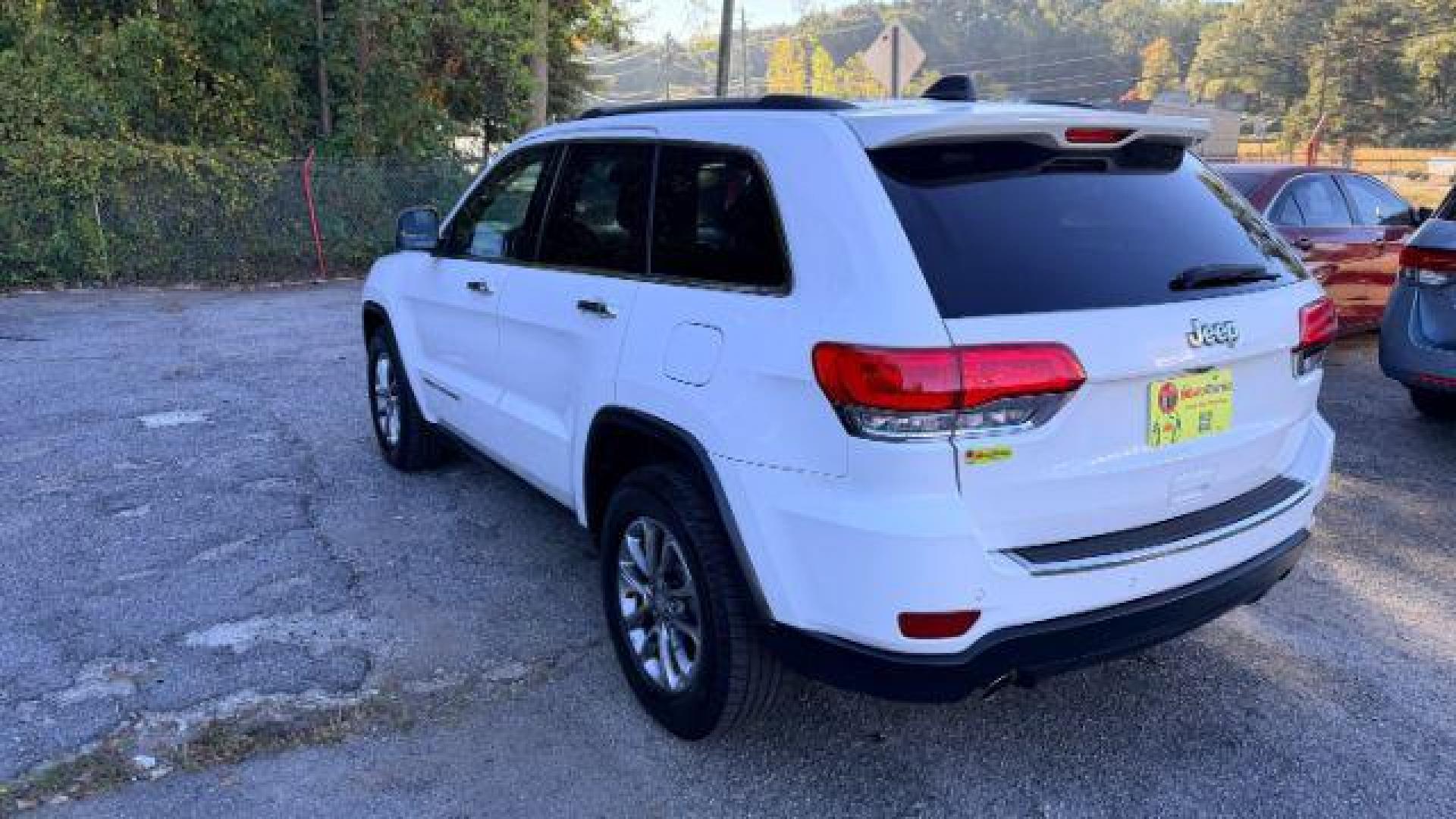 2014 White Jeep Grand Cherokee Limited (1C4RJEBG8EC) , located at 1806 Veterans Memorial Hwy SW, Austell, GA, 30168, (770) 944-9558, 33.817959, -84.606987 - Photo#5