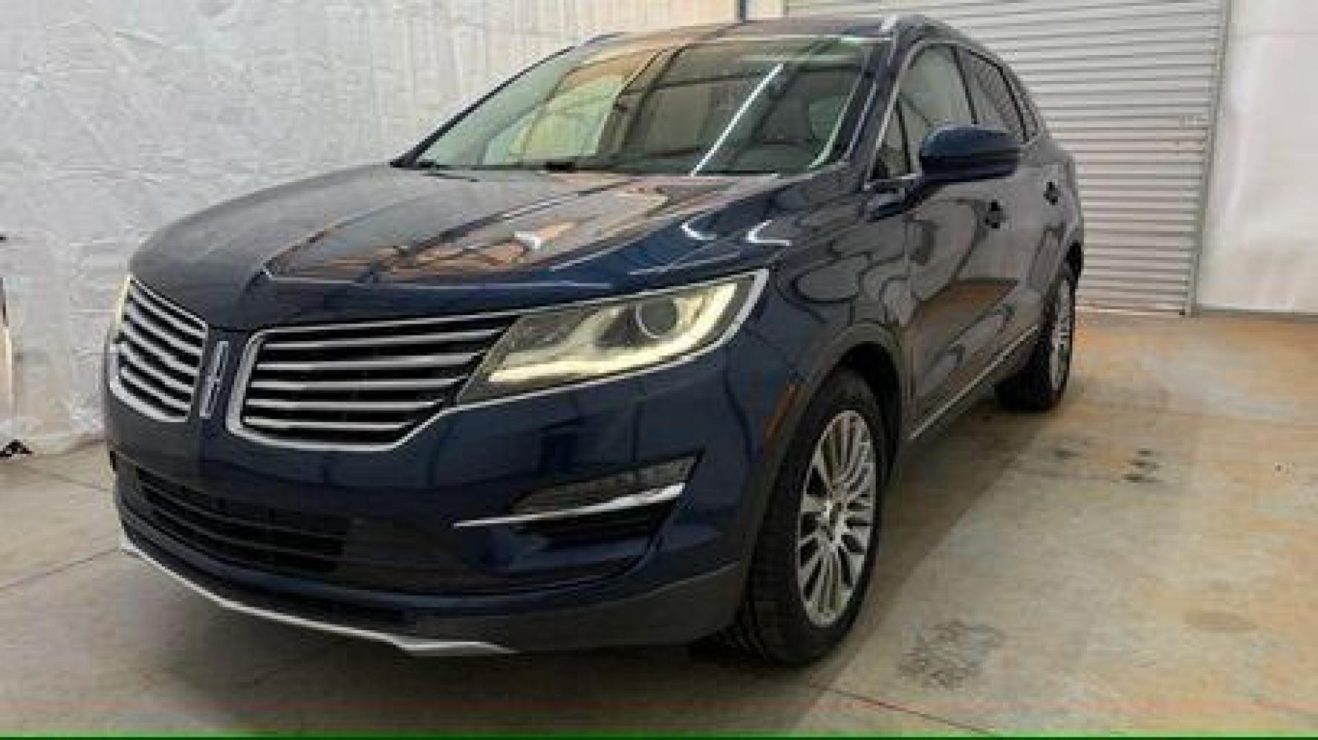 2015 Blue Lincoln MKC . (5LMCJ1A97FU) with an 2.0L engine, located at 1806 Veterans Memorial Hwy SW, Austell, GA, 30168, (770) 944-9558, 33.817959, -84.606987 - Photo#0