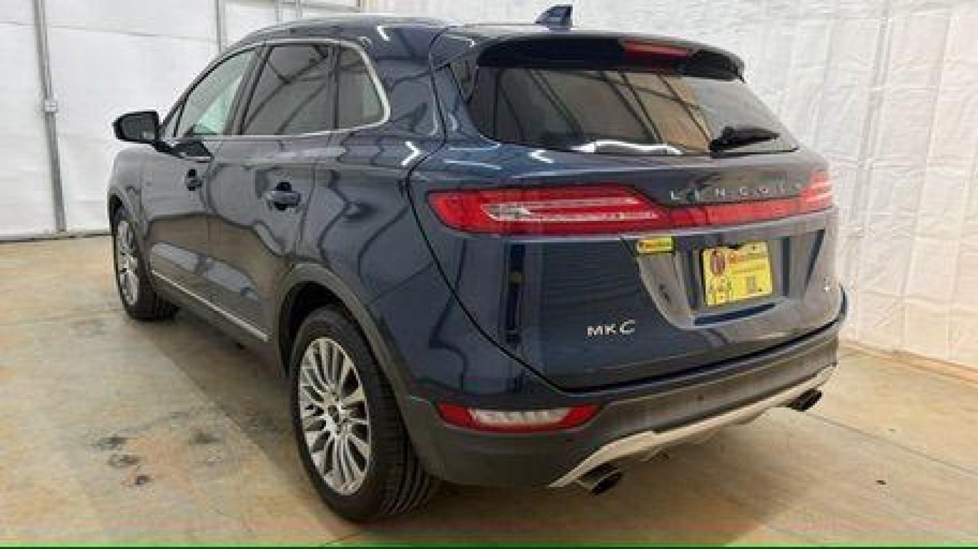 2015 Blue Lincoln MKC . (5LMCJ1A97FU) with an 2.0L engine, located at 1806 Veterans Memorial Hwy SW, Austell, GA, 30168, (770) 944-9558, 33.817959, -84.606987 - Photo#3