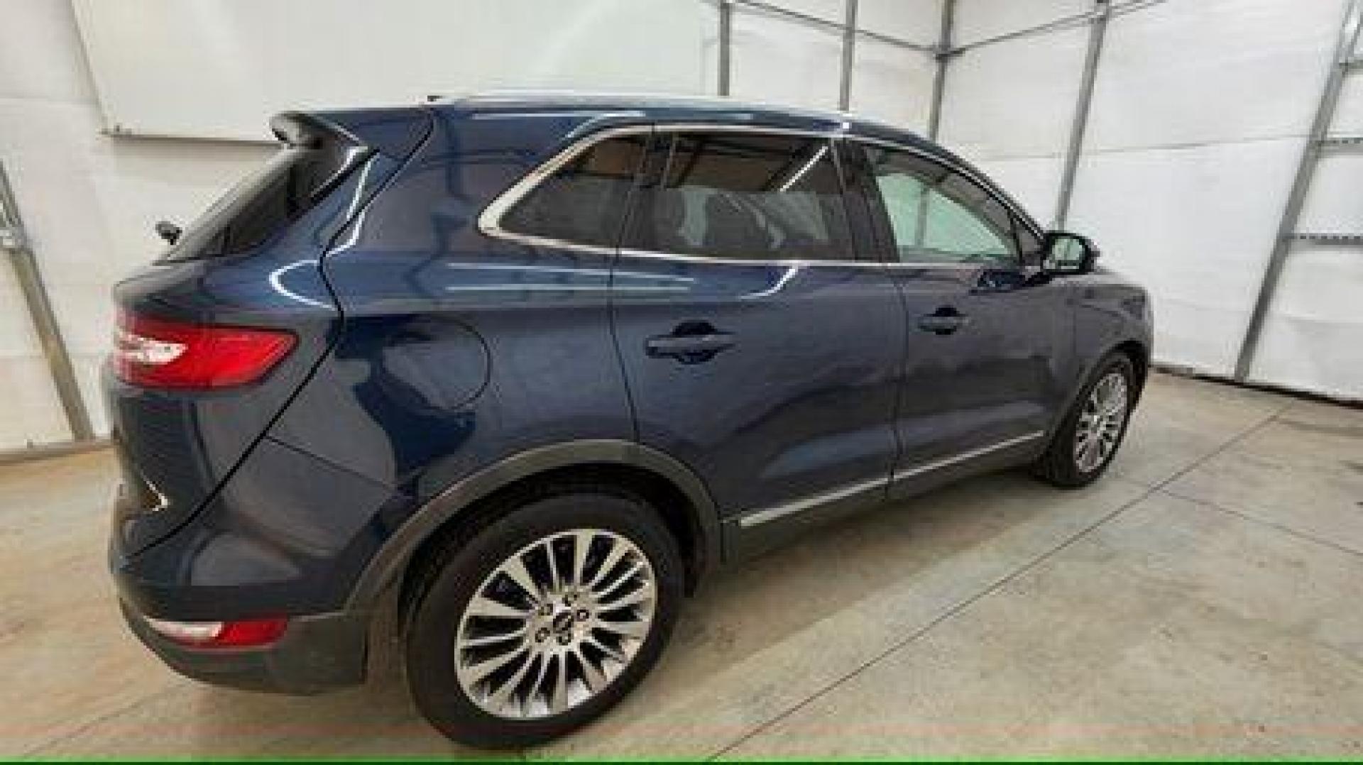 2015 Blue Lincoln MKC . (5LMCJ1A97FU) with an 2.0L engine, located at 1806 Veterans Memorial Hwy SW, Austell, GA, 30168, (770) 944-9558, 33.817959, -84.606987 - Photo#6