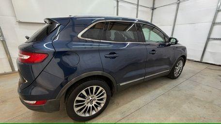 2015 Blue Lincoln MKC . (5LMCJ1A97FU) with an 2.0L engine, located at 1806 Veterans Memorial Hwy SW, Austell, GA, 30168, (770) 944-9558, 33.817959, -84.606987 - Photo#6