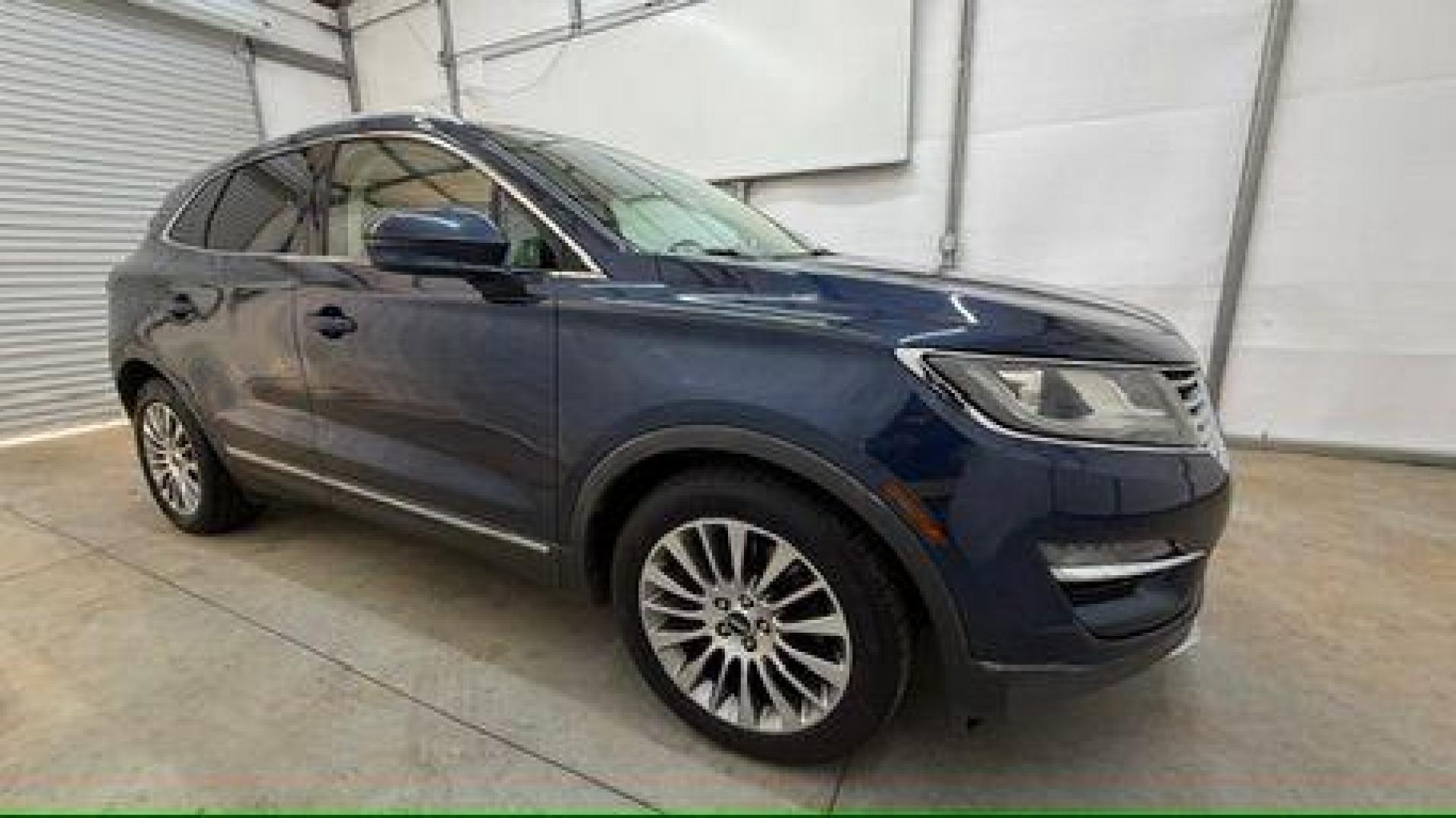 2015 Blue Lincoln MKC . (5LMCJ1A97FU) with an 2.0L engine, located at 1806 Veterans Memorial Hwy SW, Austell, GA, 30168, (770) 944-9558, 33.817959, -84.606987 - Photo#7