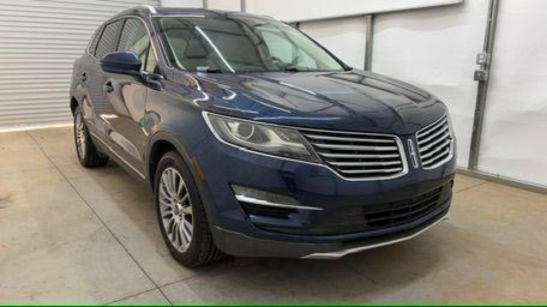2015 Blue Lincoln MKC . (5LMCJ1A97FU) with an 2.0L engine, located at 1806 Veterans Memorial Hwy SW, Austell, GA, 30168, (770) 944-9558, 33.817959, -84.606987 - Photo#8