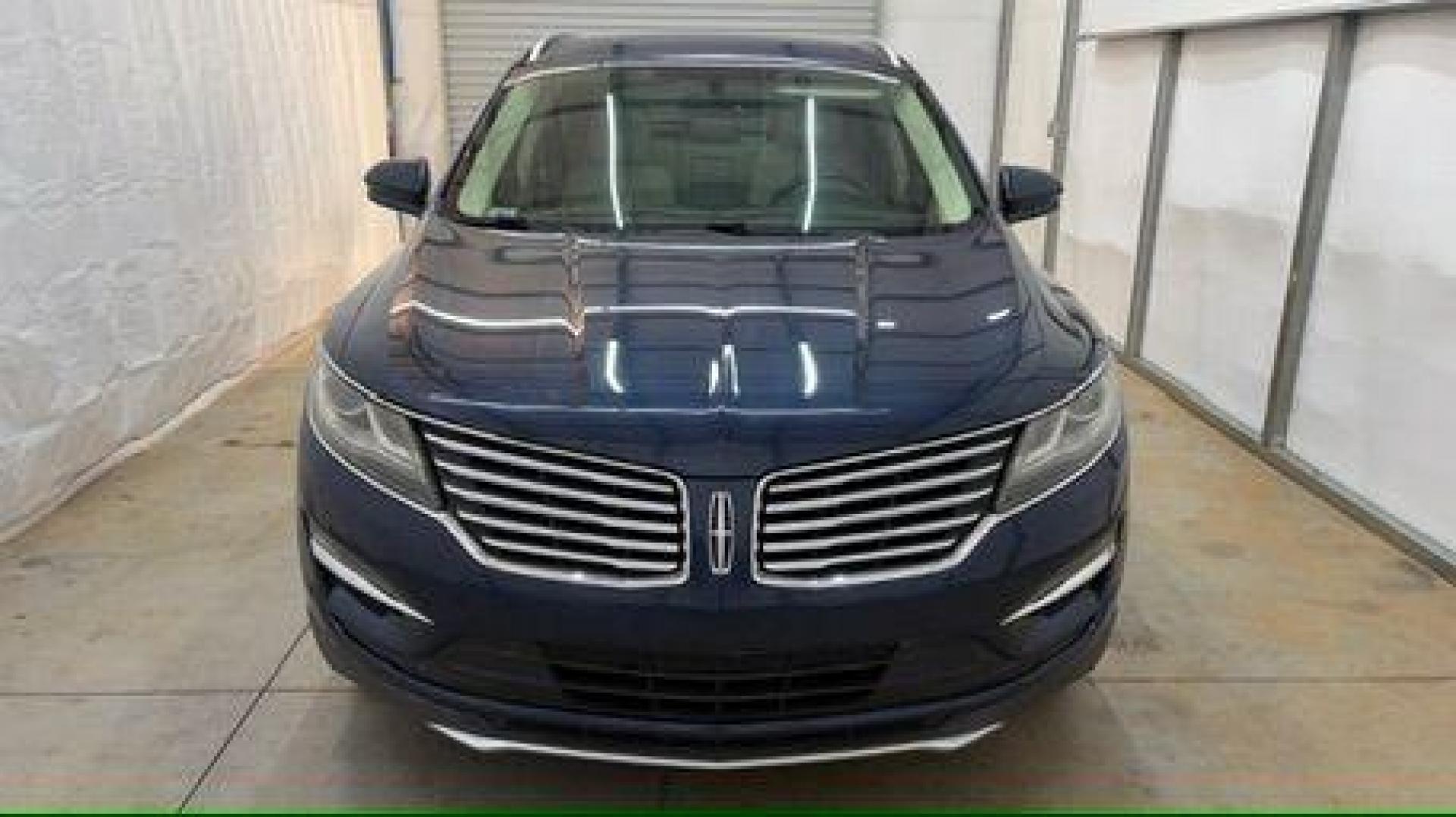 2015 Blue Lincoln MKC . (5LMCJ1A97FU) with an 2.0L engine, located at 1806 Veterans Memorial Hwy SW, Austell, GA, 30168, (770) 944-9558, 33.817959, -84.606987 - Photo#9