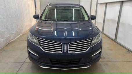 2015 Blue Lincoln MKC . (5LMCJ1A97FU) with an 2.0L engine, located at 1806 Veterans Memorial Hwy SW, Austell, GA, 30168, (770) 944-9558, 33.817959, -84.606987 - Photo#9