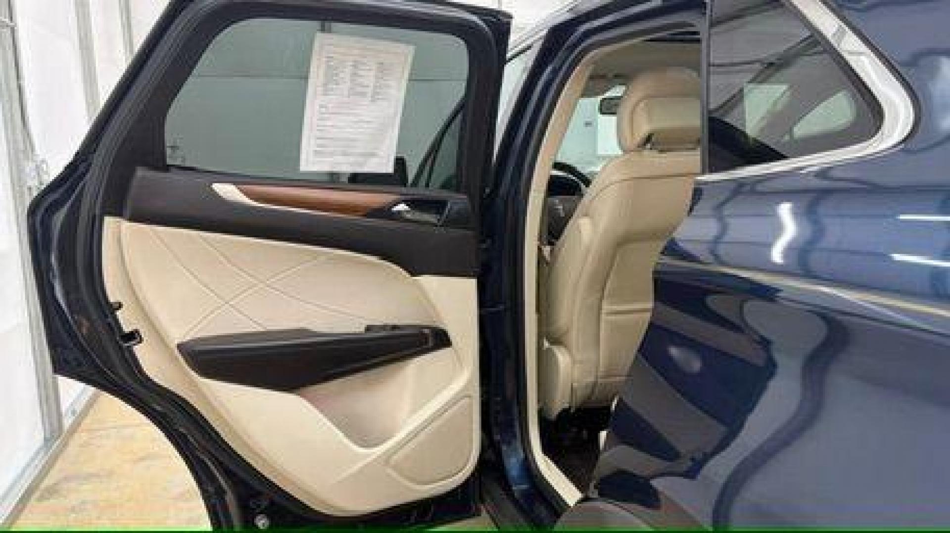 2015 Blue Lincoln MKC . (5LMCJ1A97FU) with an 2.0L engine, located at 1806 Veterans Memorial Hwy SW, Austell, GA, 30168, (770) 944-9558, 33.817959, -84.606987 - Photo#13