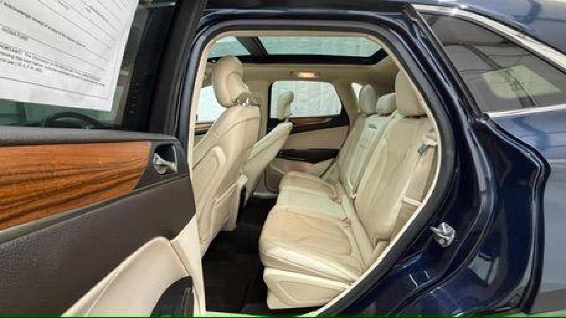 2015 Blue Lincoln MKC . (5LMCJ1A97FU) with an 2.0L engine, located at 1806 Veterans Memorial Hwy SW, Austell, GA, 30168, (770) 944-9558, 33.817959, -84.606987 - Photo#14