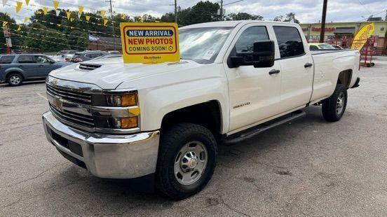 2018 White Chevrolet Silverado 2500HD WT (1GC1KUEY3JF) with an Vortec 6L V-8 variable valve control engine, located at 1806 Veterans Memorial Hwy SW, Austell, GA, 30168, (770) 944-9558, 33.817959, -84.606987 - Photo#0