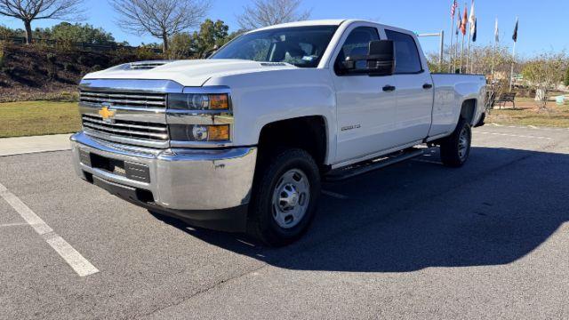 2018 White Chevrolet Silverado 2500HD WT (1GC1KUEY3JF) with an Vortec 6L V-8 variable valve control engine, located at 1806 Veterans Memorial Hwy SW, Austell, GA, 30168, (770) 944-9558, 33.817959, -84.606987 - Photo#1
