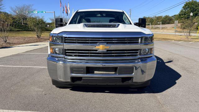 2018 White Chevrolet Silverado 2500HD WT (1GC1KUEY3JF) with an Vortec 6L V-8 variable valve control engine, located at 1806 Veterans Memorial Hwy SW, Austell, GA, 30168, (770) 944-9558, 33.817959, -84.606987 - Photo#2