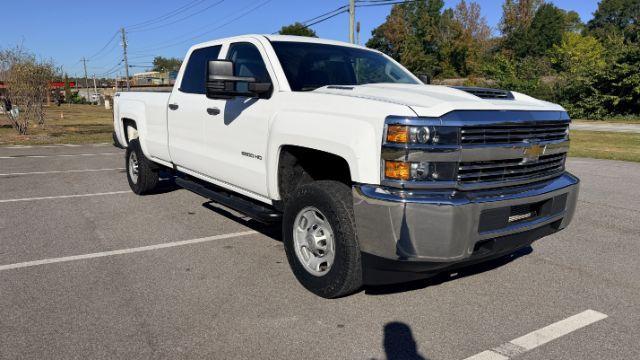 2018 White Chevrolet Silverado 2500HD WT (1GC1KUEY3JF) with an Vortec 6L V-8 variable valve control engine, located at 1806 Veterans Memorial Hwy SW, Austell, GA, 30168, (770) 944-9558, 33.817959, -84.606987 - Photo#3