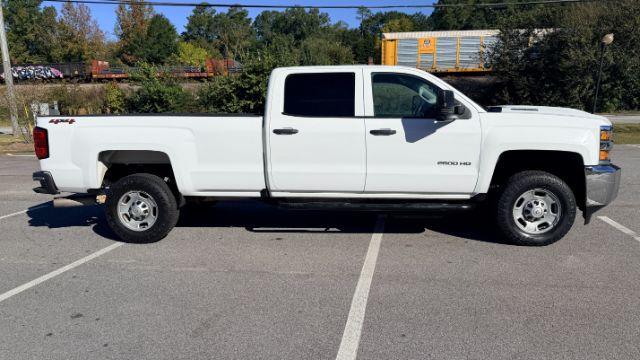 2018 White Chevrolet Silverado 2500HD WT (1GC1KUEY3JF) with an Vortec 6L V-8 variable valve control engine, located at 1806 Veterans Memorial Hwy SW, Austell, GA, 30168, (770) 944-9558, 33.817959, -84.606987 - Photo#4