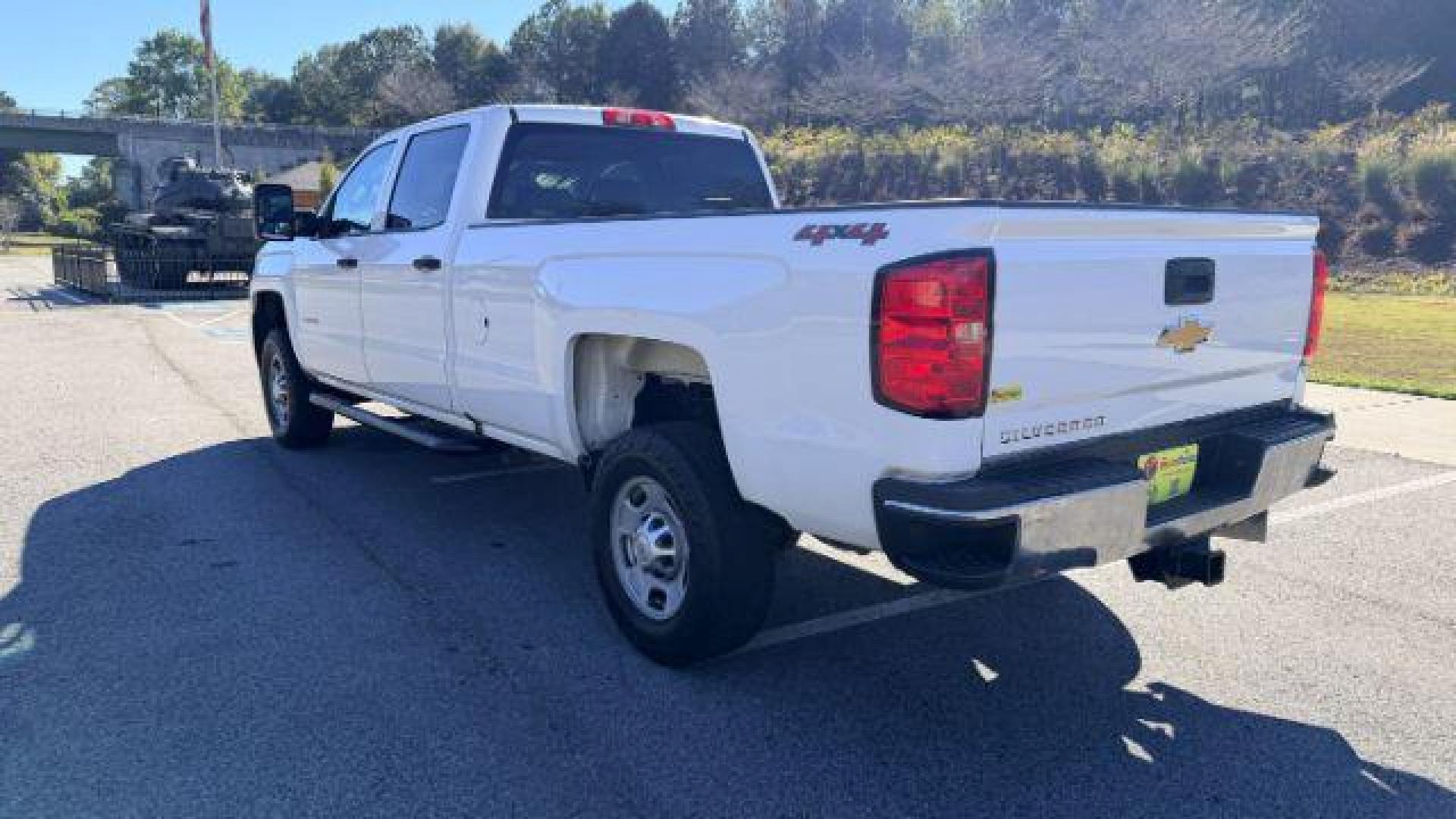 2018 White Chevrolet Silverado 2500HD WT (1GC1KUEY3JF) with an Vortec 6L V-8 variable valve control engine, located at 1806 Veterans Memorial Hwy SW, Austell, GA, 30168, (770) 944-9558, 33.817959, -84.606987 - Photo#7