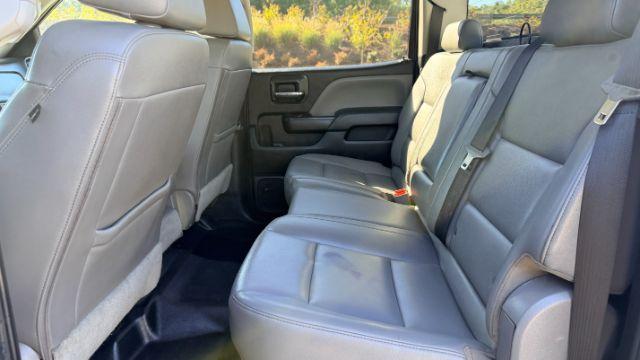 2018 White Chevrolet Silverado 2500HD WT (1GC1KUEY3JF) with an Vortec 6L V-8 variable valve control engine, located at 1806 Veterans Memorial Hwy SW, Austell, GA, 30168, (770) 944-9558, 33.817959, -84.606987 - Photo#16